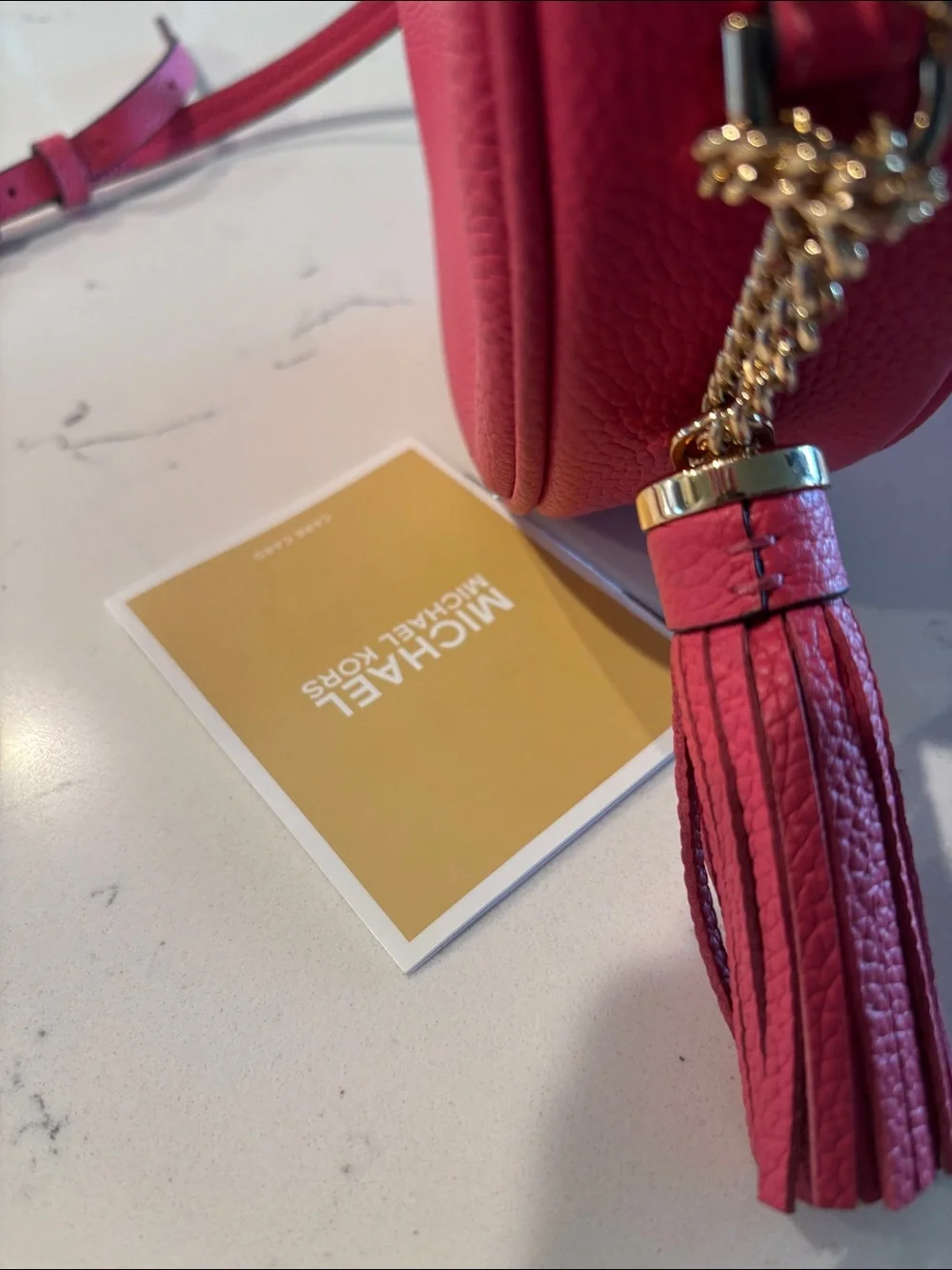 NWOT Michael Kors Coral Pink Round Crossbody Bag with Tassel